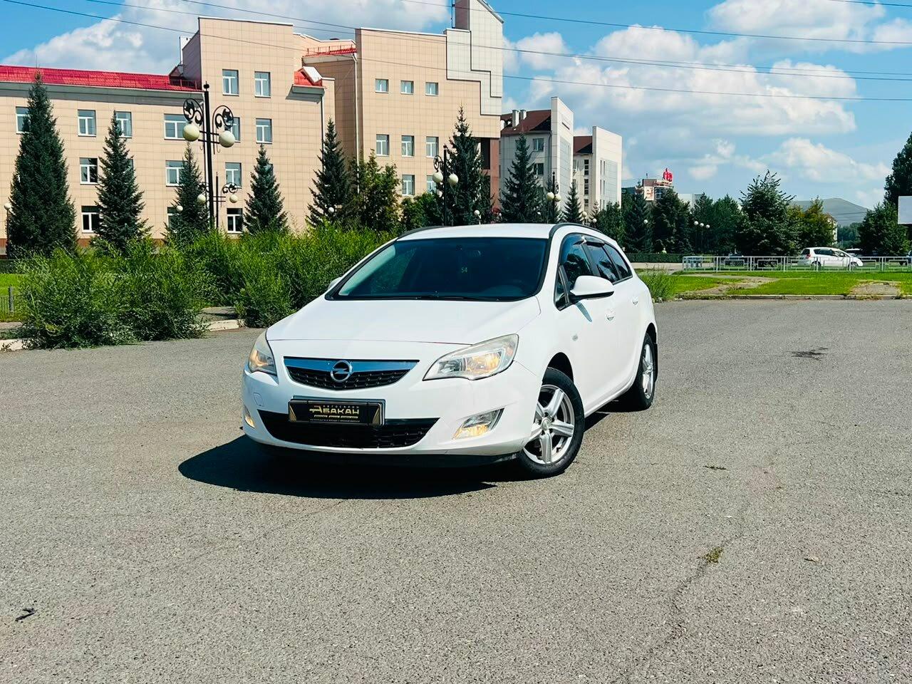 Opel Astra — фото 1