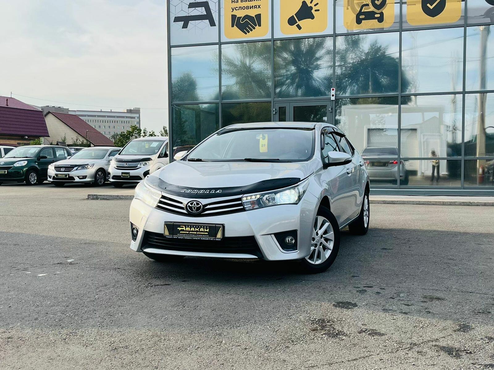 Toyota Corolla 1.6 MT (122 л.с.) 2014