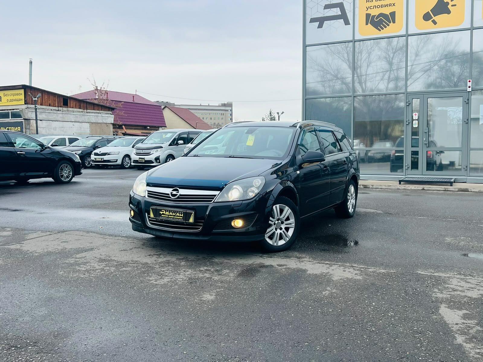 Opel Astra — фото 1
