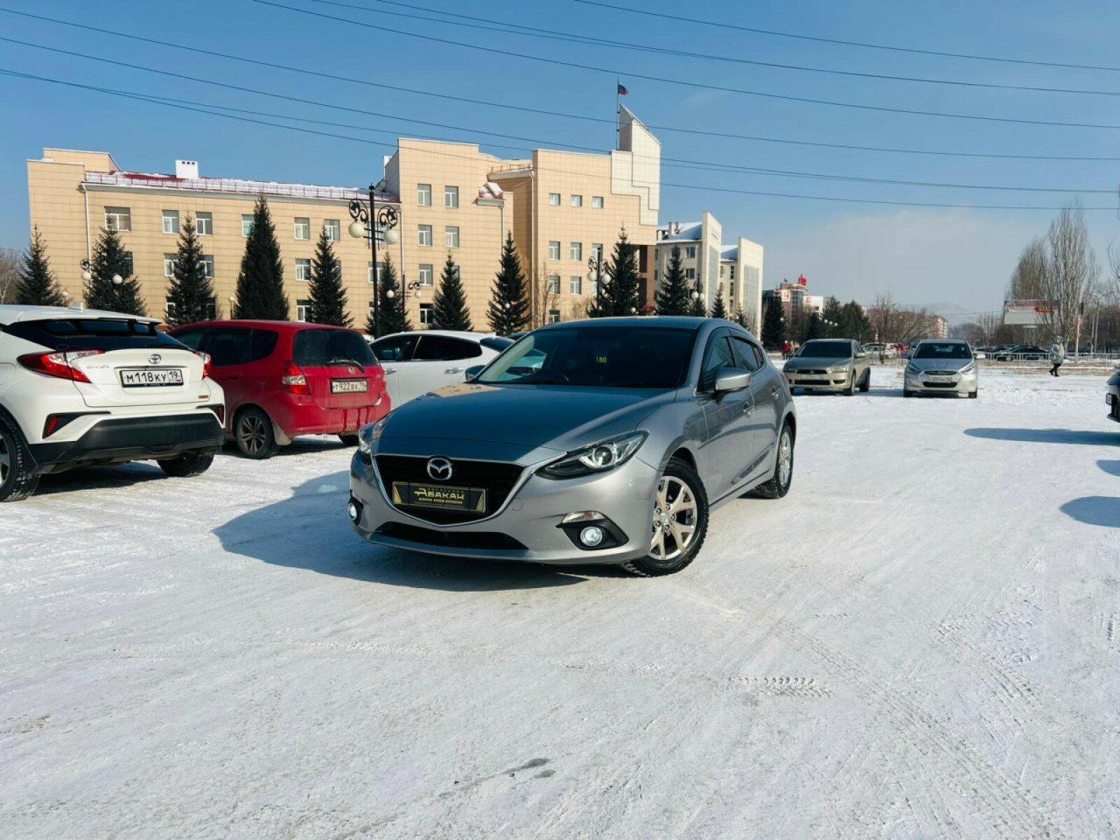 Mazda Axela — фото 1
