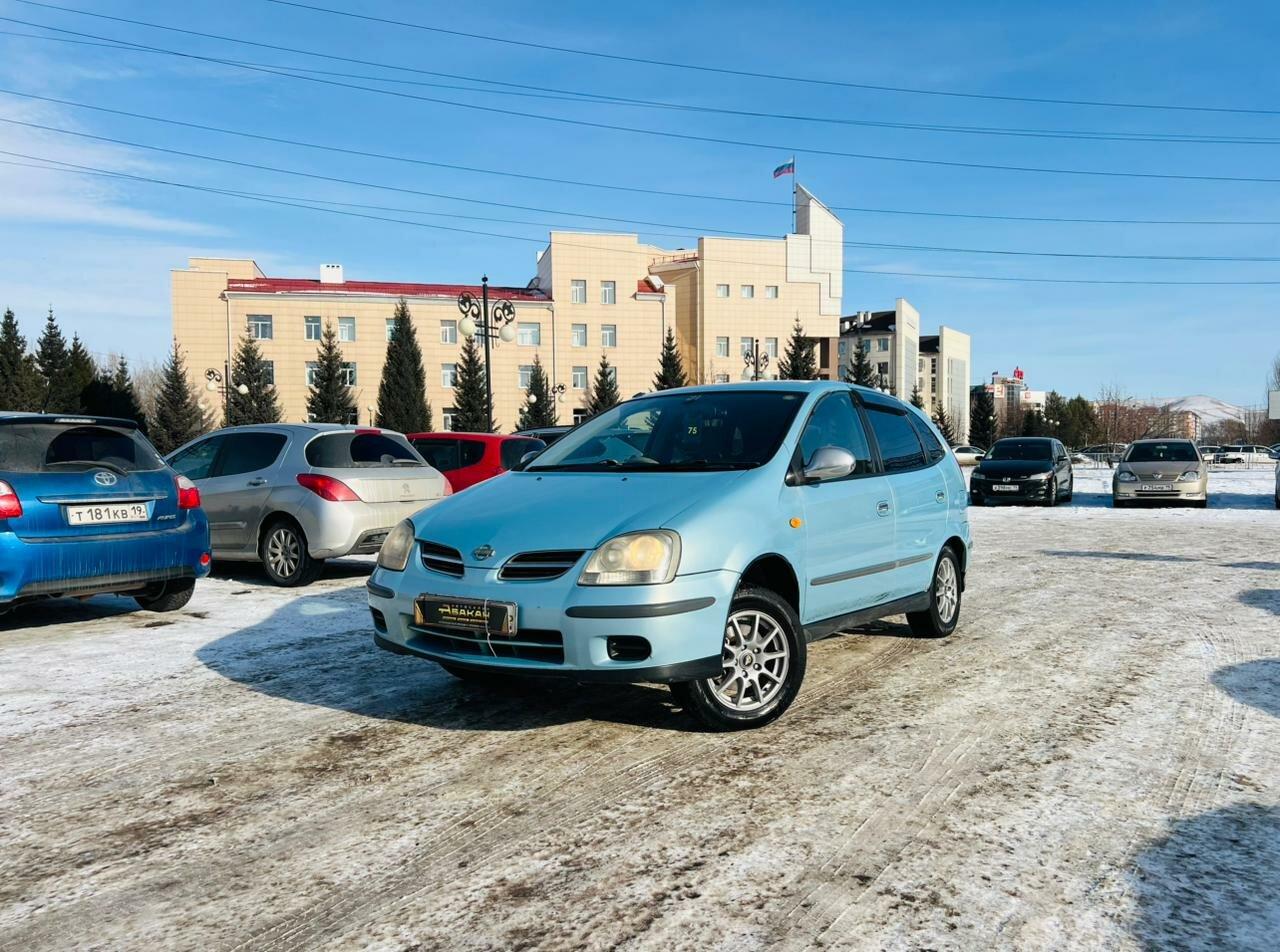 Nissan Tino — фото 1