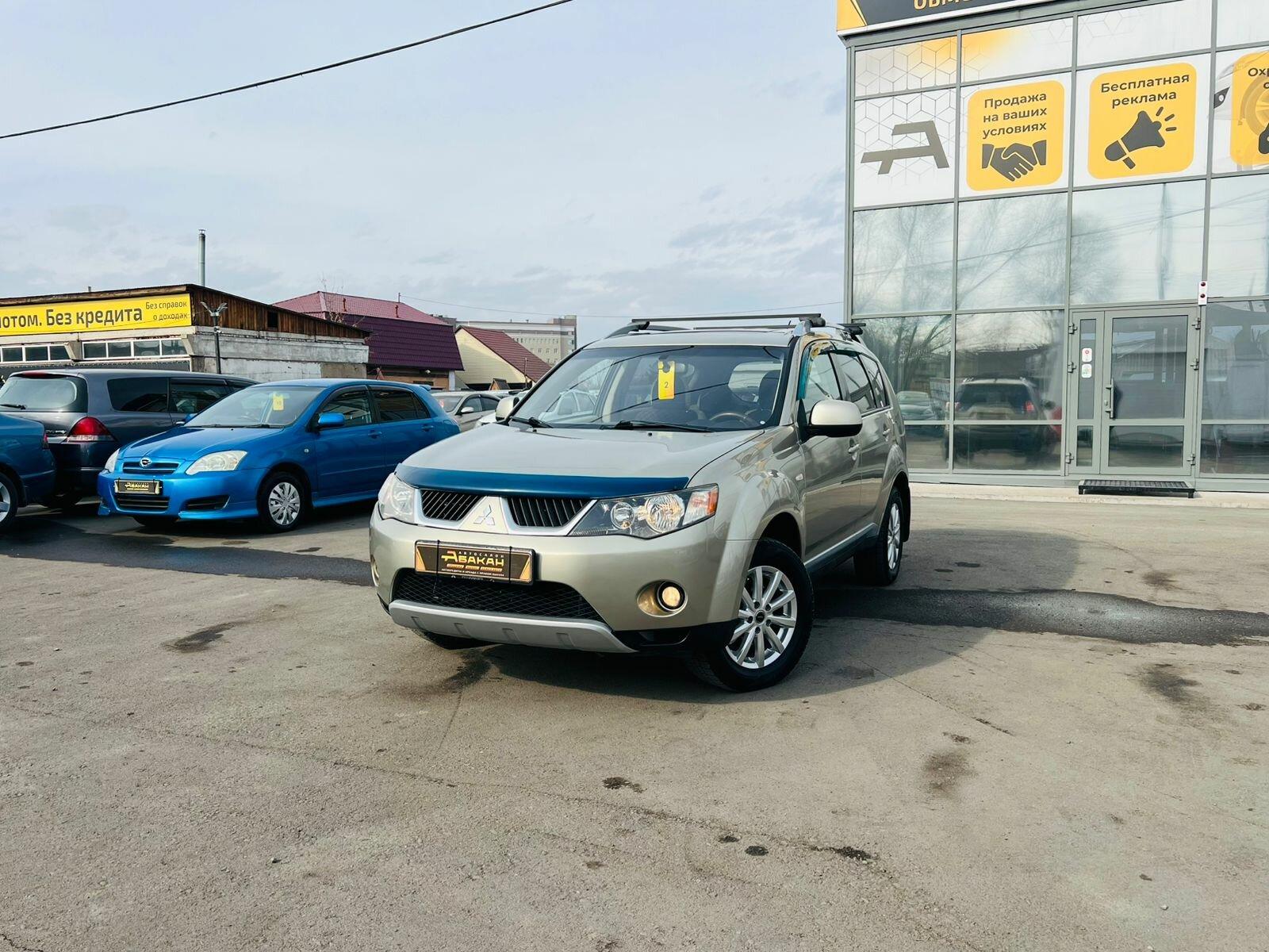 Mitsubishi Outlander — фото 1