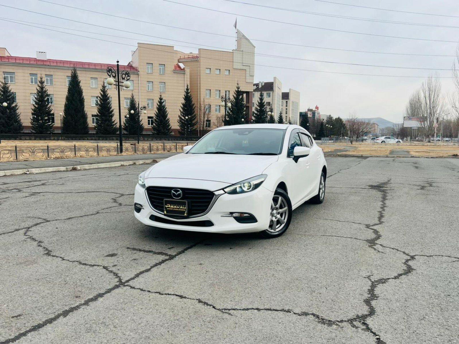 Mazda Axela — фото 1