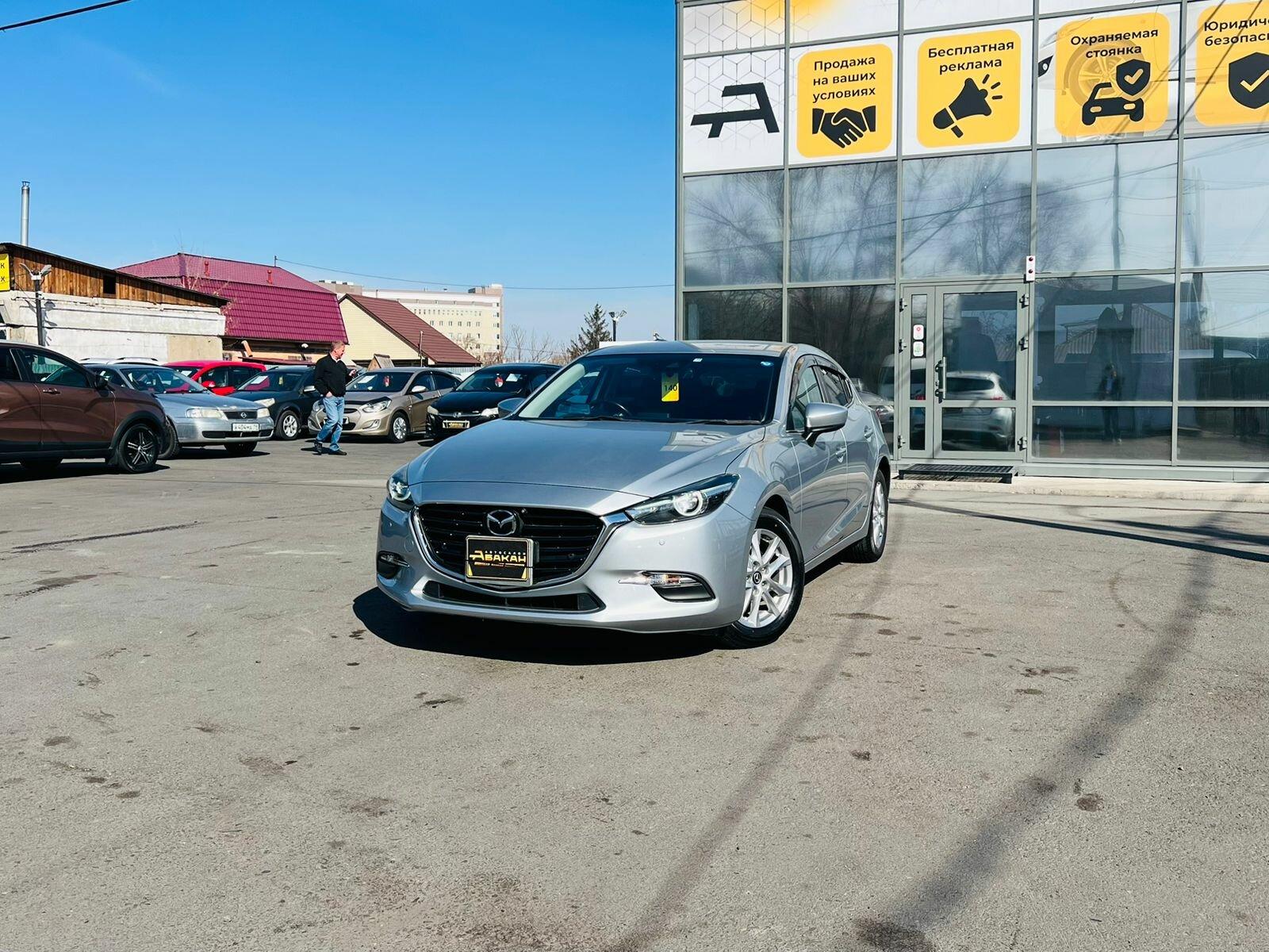 Mazda Axela — фото 1