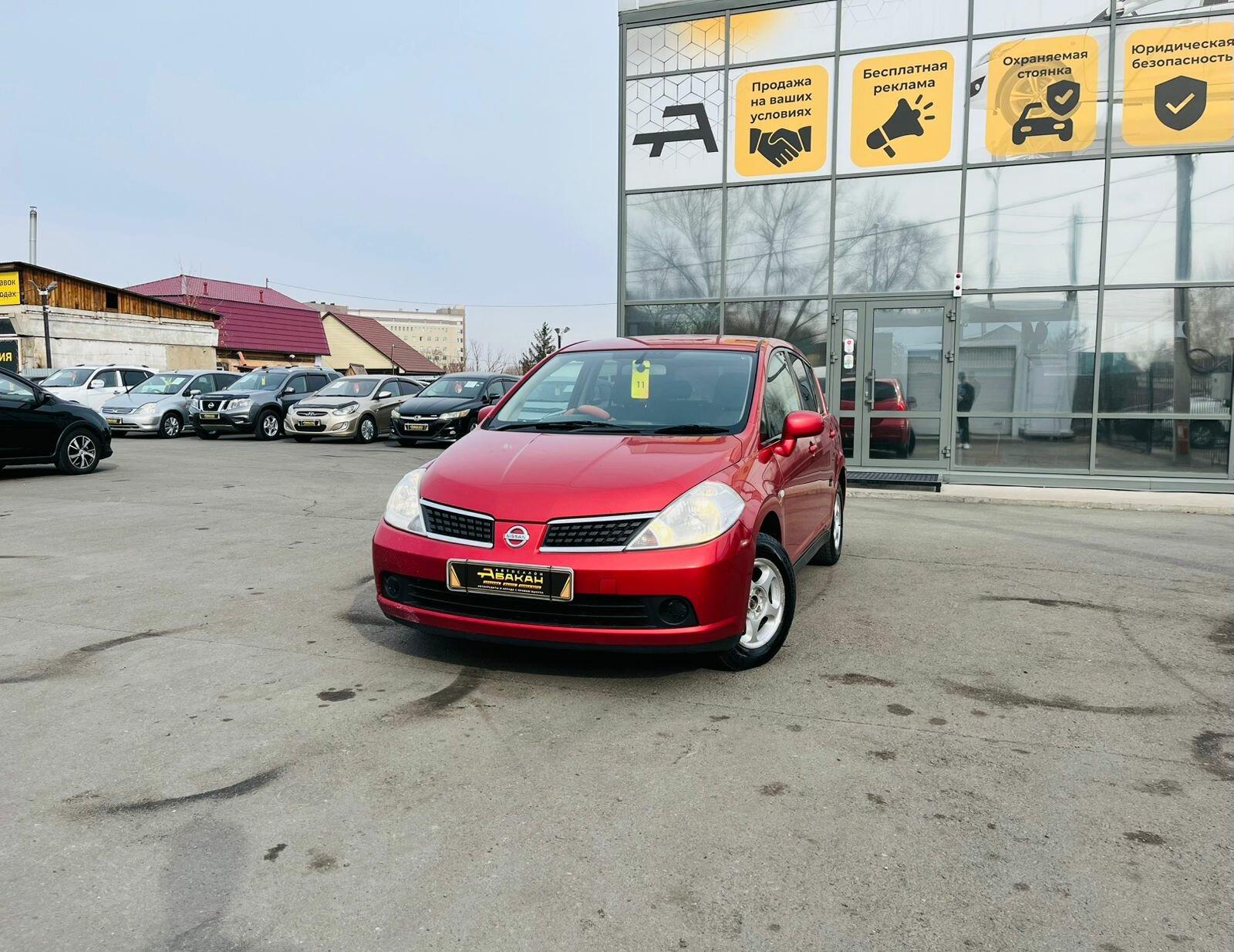 Nissan Tiida — фото 1