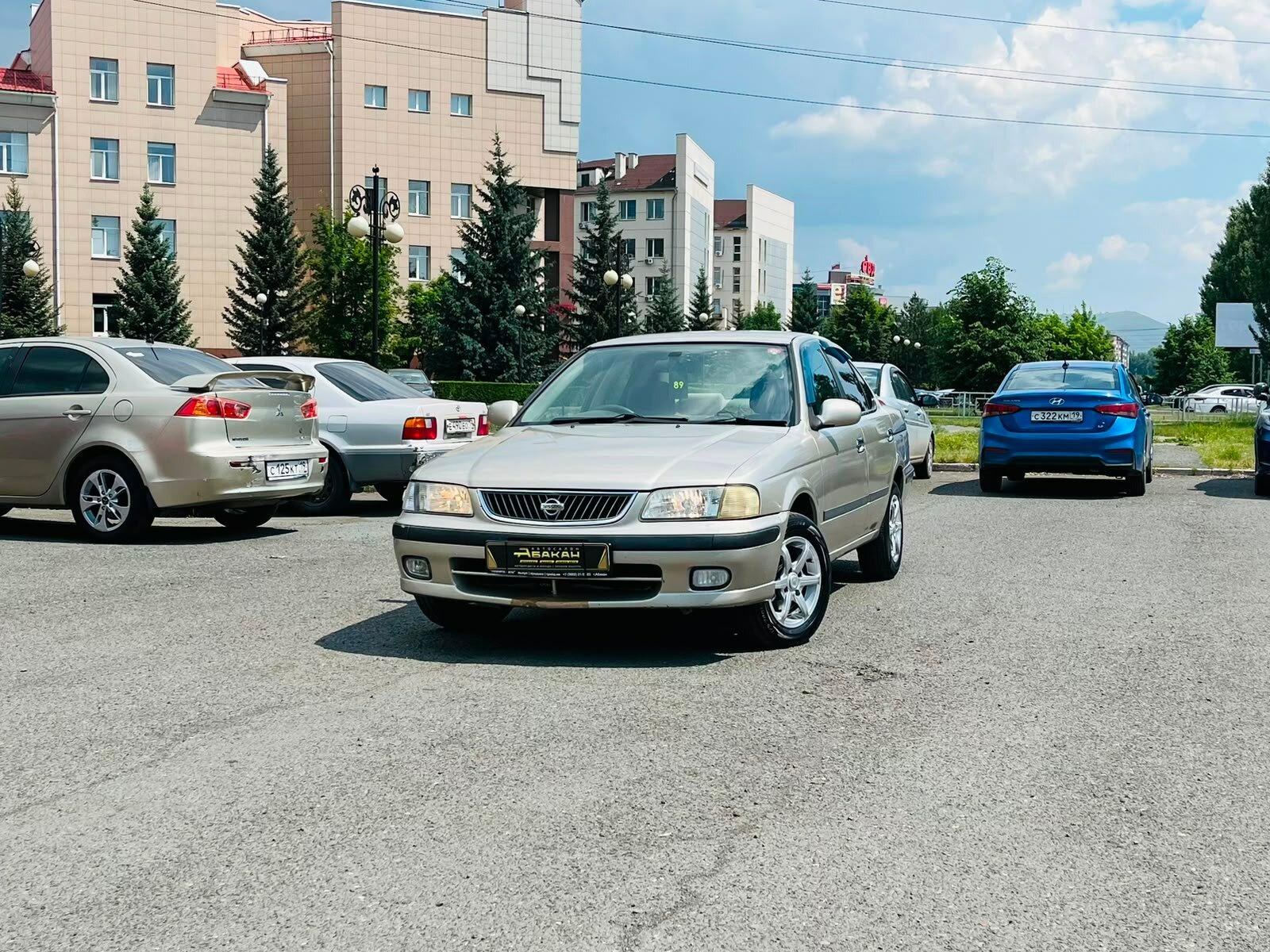 Nissan Sunny — фото 1