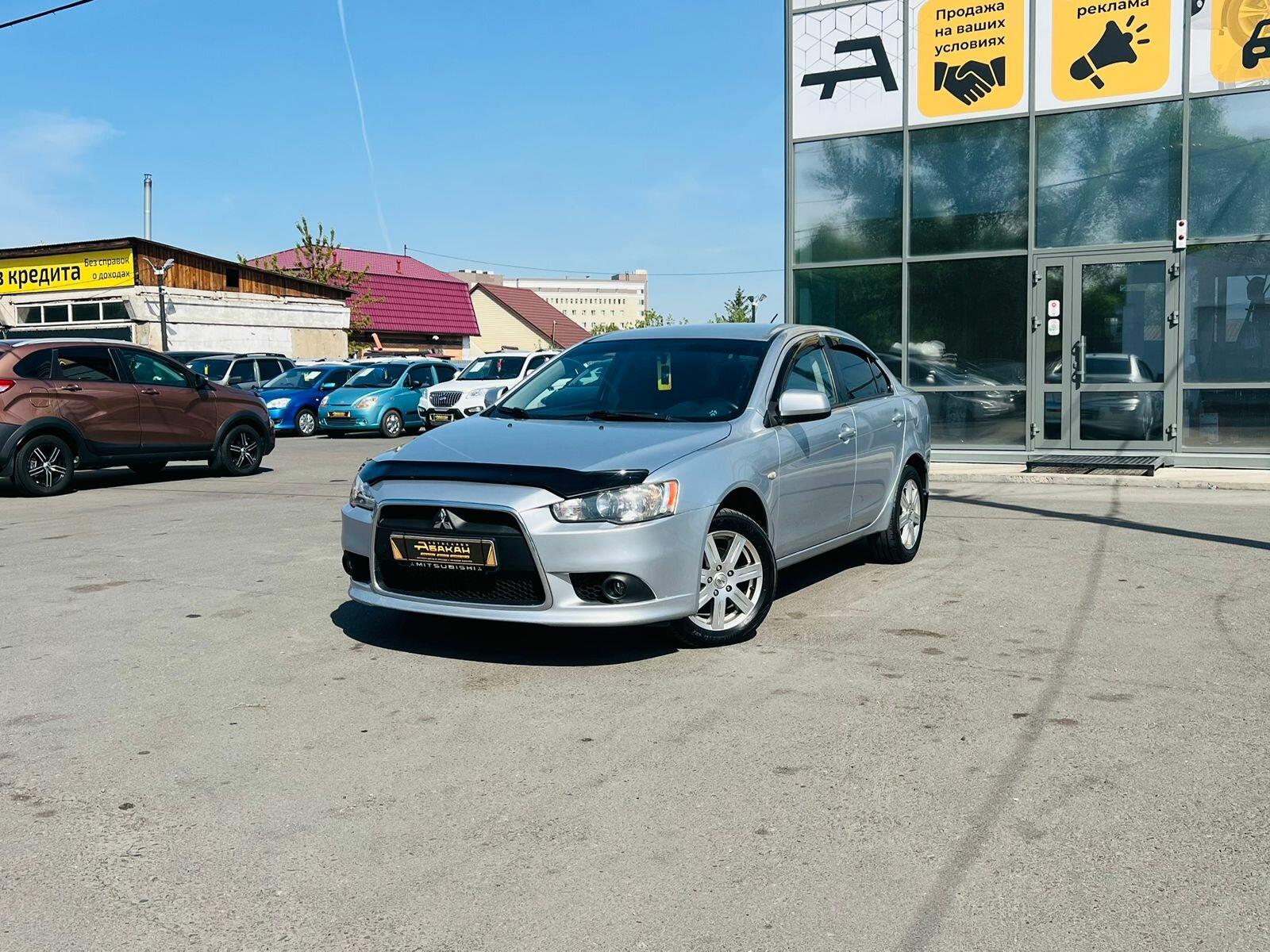 Mitsubishi Lancer — фото 1